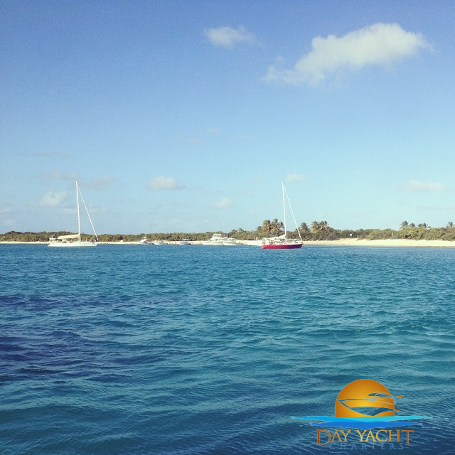 Private yacht with guests relaxing on the sundeck, Puerto Rico yacht rental